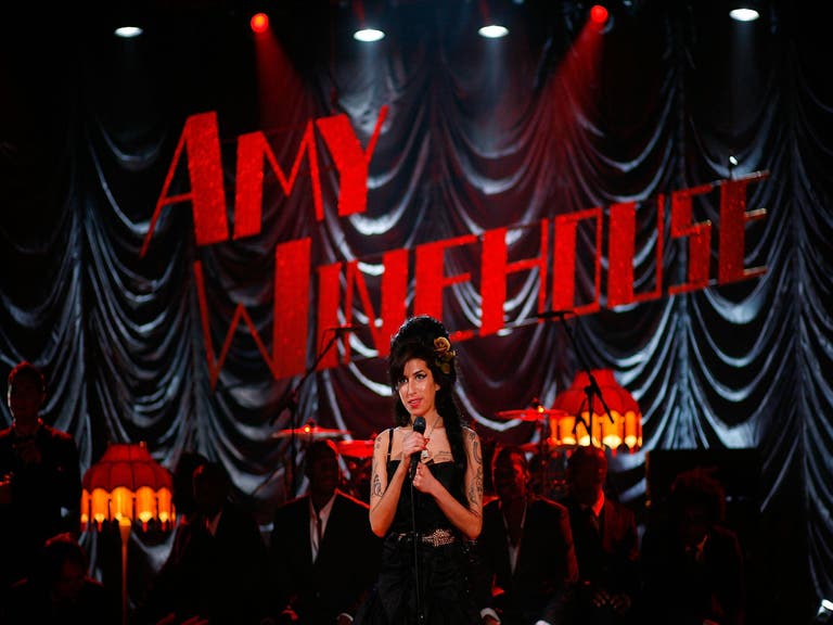 Amy Winehouse performs at the 50th GRAMMY Awards live via satellite from London